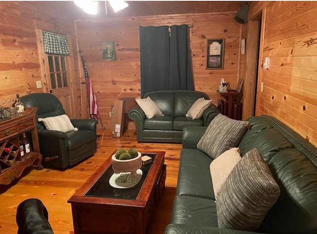 11 Cedar Ln, Putnam, IL 61560 - living room featuring wooden walls and wood finished floors