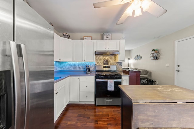19 Briar Ln, Geneva, IL 60134 - kitchen featuring stainless steel appliances, dark wood finished floors, under cabinet range hood, tasteful backsplash, and white cabinetry