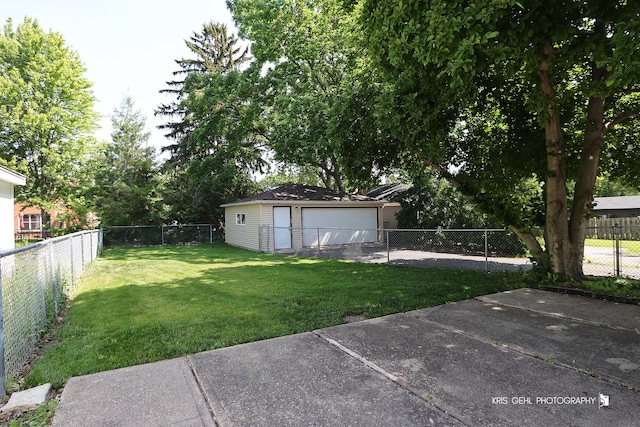 509 E Illinois St, Wheaton, IL 60187 - fenced backyard with a detached garage and an outbuilding