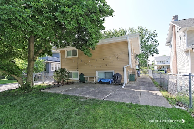 509 E Illinois St, Wheaton, IL 60187 - rear view of house featuring a patio and a fenced backyard