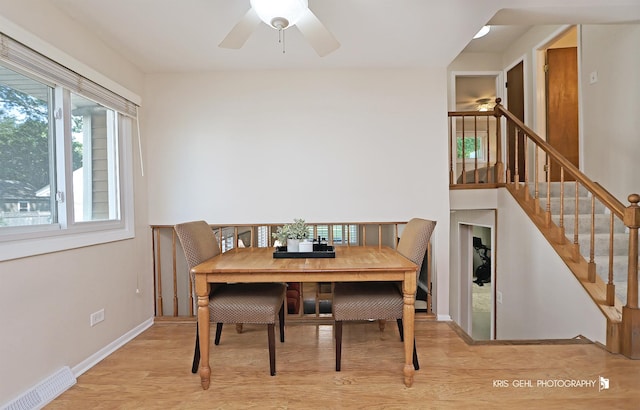 509 E Illinois St, Wheaton, IL 60187 - dining space featuring wood finished floors, ceiling fan, and stairway