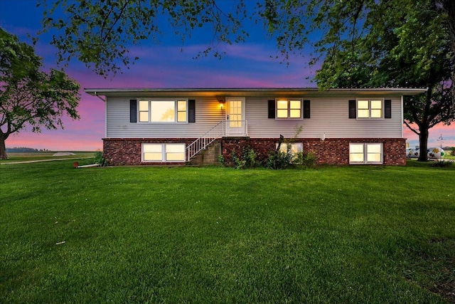 708 N 1950th Rd, Tonica, IL 61370 - bi-level home featuring a yard and brick siding