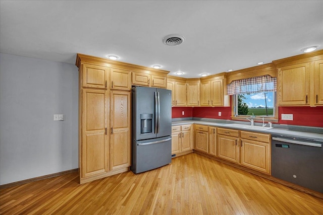 708 N 1950th Rd, Tonica, IL 61370 - kitchen featuring stainless steel refrigerator with ice dispenser, dishwasher, light wood-type flooring, and light countertops