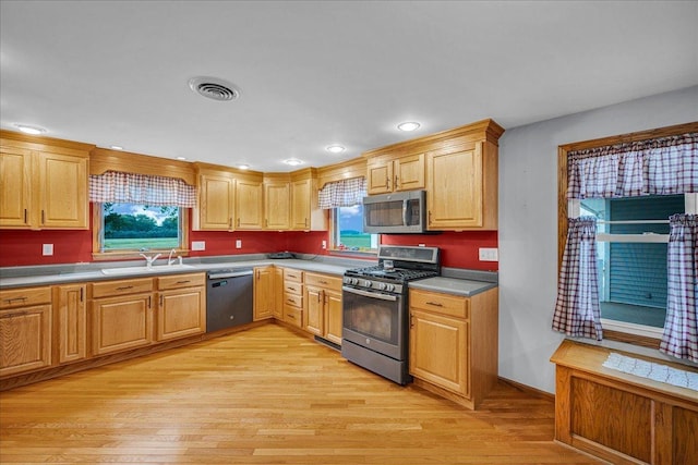 708 N 1950th Rd, Tonica, IL 61370 - kitchen featuring stainless steel appliances, light wood finished floors, light countertops, and recessed lighting