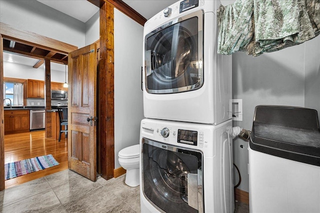 708 N 1950th Rd, Tonica, IL 61370 - laundry room featuring estacked washer and dryer