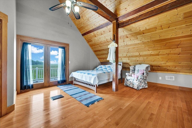 708 N 1950th Rd, Tonica, IL 61370 - bedroom featuring vaulted ceiling, access to exterior, wood finished floors, wood ceiling, and a ceiling fan