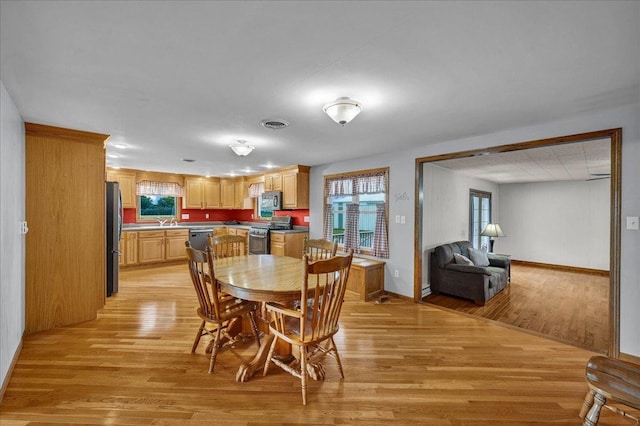 708 N 1950th Rd, Tonica, IL 61370 - dining space featuring light wood-type flooring