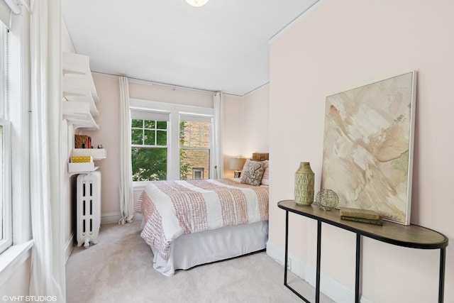 2635 Poplar Ave, Evanston, IL 60201 - carpeted bedroom featuring radiator and baseboards