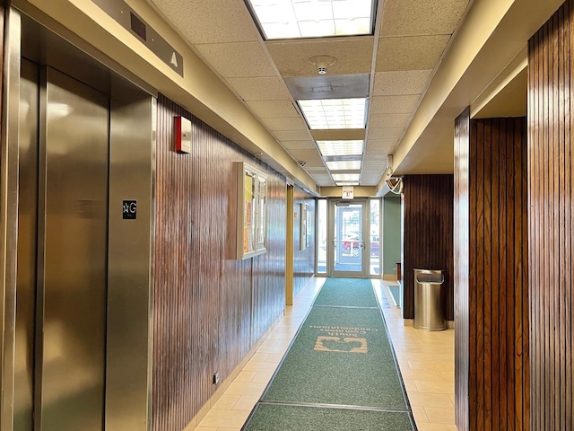 3001 S Michigan Ave Unit 909, Chicago, IL 60616 - hallway featuring a paneled ceiling and wood walls