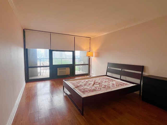 3001 S Michigan Ave Unit 909, Chicago, IL 60616 - bedroom with wood finished floors, a wall mounted AC, and ornamental molding