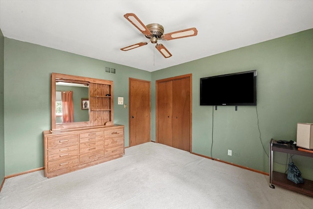 9242 Pembrooke Ln, Orland Park, IL 60462 - unfurnished bedroom featuring carpet floors, a closet, and a ceiling fan