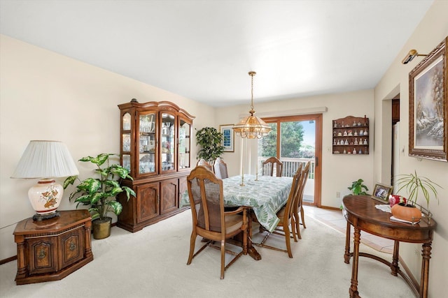 9242 Pembrooke Ln, Orland Park, IL 60462 - dining room featuring a chandelier and light colored carpet
