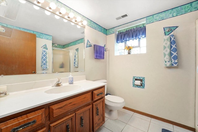 9242 Pembrooke Ln, Orland Park, IL 60462 - full bathroom featuring vanity, a shower stall, and tile patterned floors