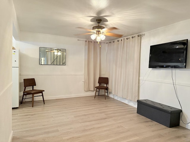 1318 Pine Grove Ave, Round Lake Beach, IL 60073 - unfurnished room with ceiling fan, light wood-style flooring, and ornamental molding
