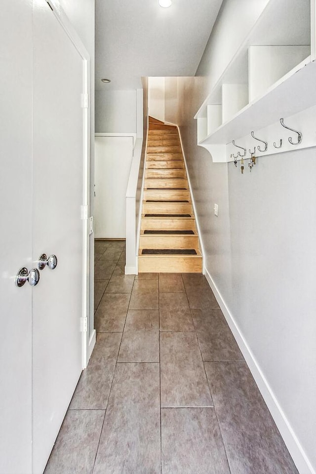 1223 W Cottage Pl, Chicago, IL 60607 - staircase with tile patterned flooring and baseboards