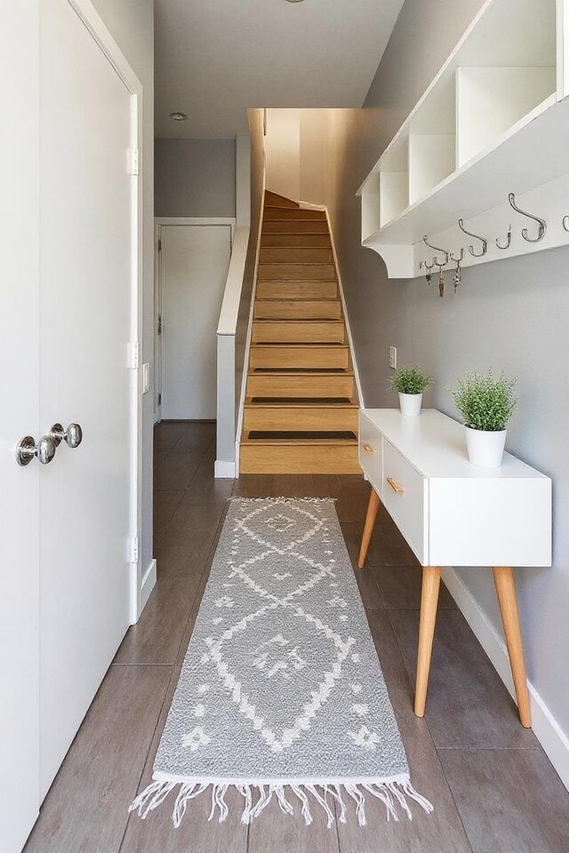 1223 W Cottage Pl, Chicago, IL 60607 - stairs with tile patterned flooring and baseboards