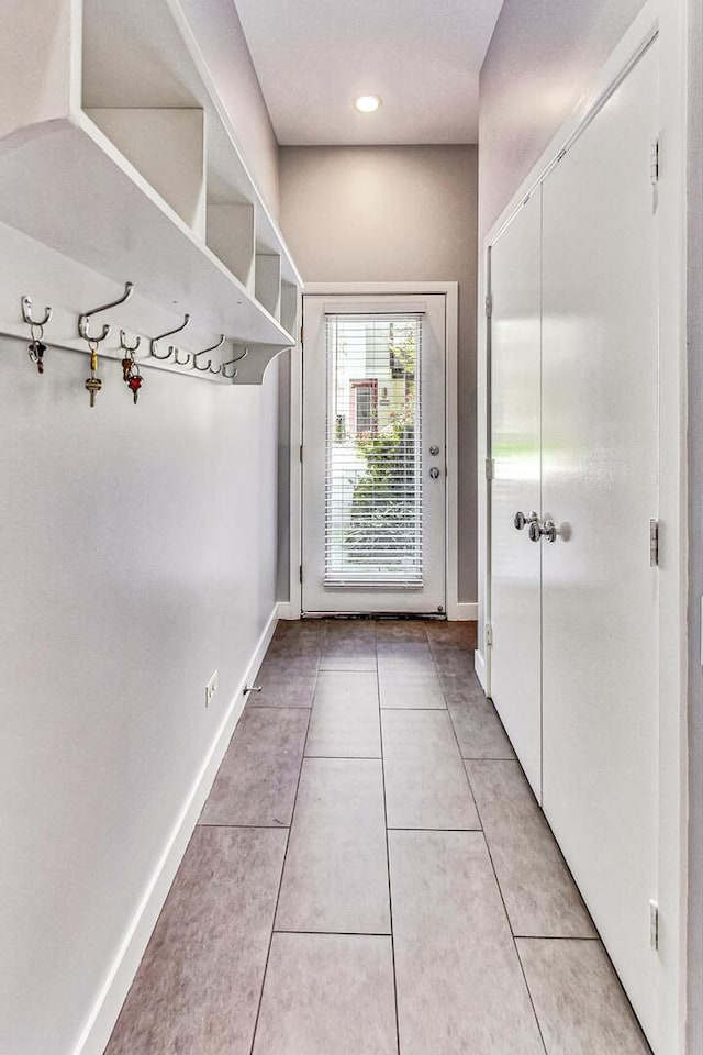 1223 W Cottage Pl, Chicago, IL 60607 - doorway featuring light tile patterned flooring and recessed lighting