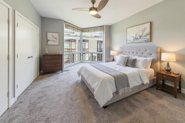 1223 W Cottage Pl, Chicago, IL 60607 - bedroom with carpet floors, a wall of windows, and ceiling fan
