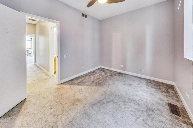 1223 W Cottage Pl, Chicago, IL 60607 - carpeted spare room with a ceiling fan and baseboards