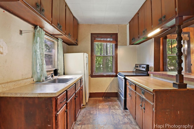 35835 N Ash St, Ingleside, IL 60041 - kitchen featuring stainless steel range with electric stovetop, light countertops, and freestanding refrigerator