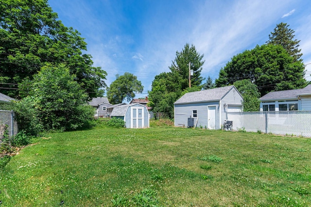 1020 N 8th St, Rochelle, IL 61068 - view of yard featuring a detached garage and a storage unit