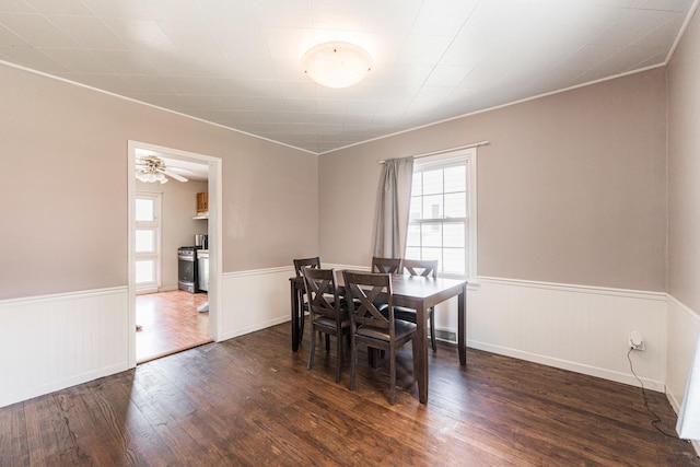 1020 N 8th St, Rochelle, IL 61068 - dining area with dark wood-type flooring, healthy amount of natural light, and a wainscoted wall