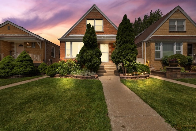 7220 S Spaulding Ave, Chicago, IL 60629 - bungalow-style home with brick siding and a yard