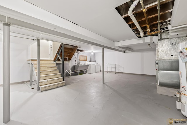 7220 S Spaulding Ave, Chicago, IL 60629 - unfinished below grade area featuring separate washer and dryer, stairway, water heater, and heating unit