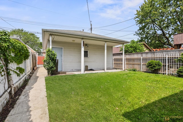 7220 S Spaulding Ave, Chicago, IL 60629 - rear view of house with a patio area