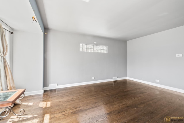 7220 S Spaulding Ave, Chicago, IL 60629 - unfurnished room featuring wood finished floors and baseboards