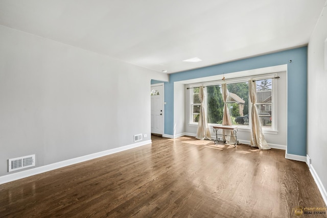 7220 S Spaulding Ave, Chicago, IL 60629 - spare room featuring wood finished floors
