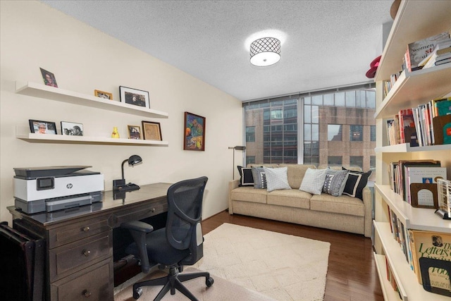 800 Elgin Rd Unit 1021, Evanston, IL 60201 - home office featuring wood finished floors and a textured ceiling