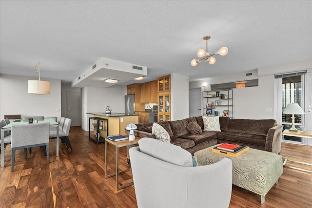 800 Elgin Rd Unit 1021, Evanston, IL 60201 - living area with dark wood-type flooring and a chandelier