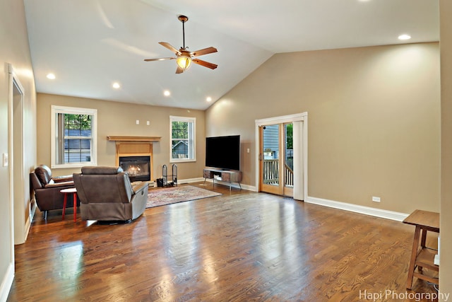1340 Park Ave, Winthrop Harbor, IL 60096 - living room with a glass covered fireplace, ceiling fan, wood finished floors, recessed lighting, and high vaulted ceiling