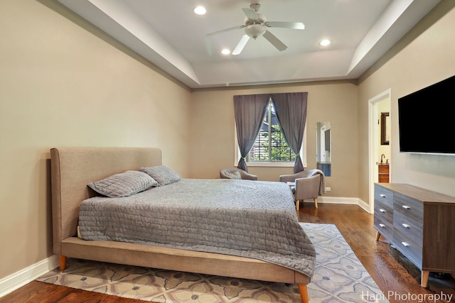 1340 Park Ave, Winthrop Harbor, IL 60096 - bedroom featuring a tray ceiling, recessed lighting, dark wood-type flooring, and a ceiling fan