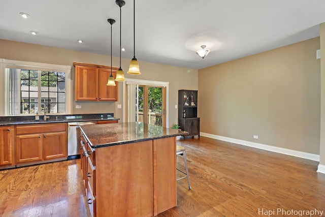 1340 Park Ave, Winthrop Harbor, IL 60096 - kitchen with dishwasher, plenty of natural light, brown cabinets, and recessed lighting