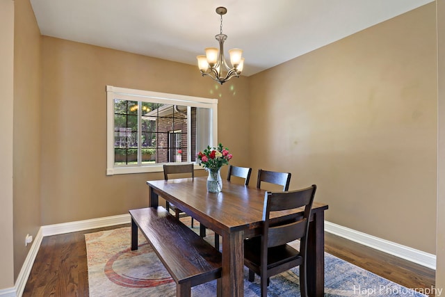 1340 Park Ave, Winthrop Harbor, IL 60096 - dining room featuring a chandelier and wood finished floors