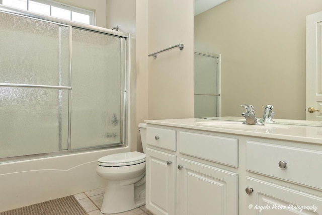 13399 Glenwood Dr, Huntley, IL 60142 - full bath with vanity, tile patterned flooring, and bath / shower combo with glass door