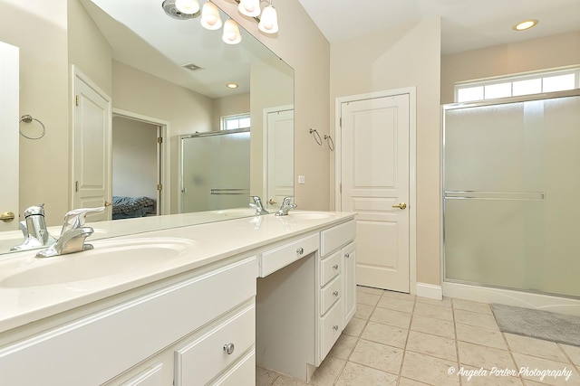 13399 Glenwood Dr, Huntley, IL 60142 - ensuite bathroom featuring double vanity and a stall shower