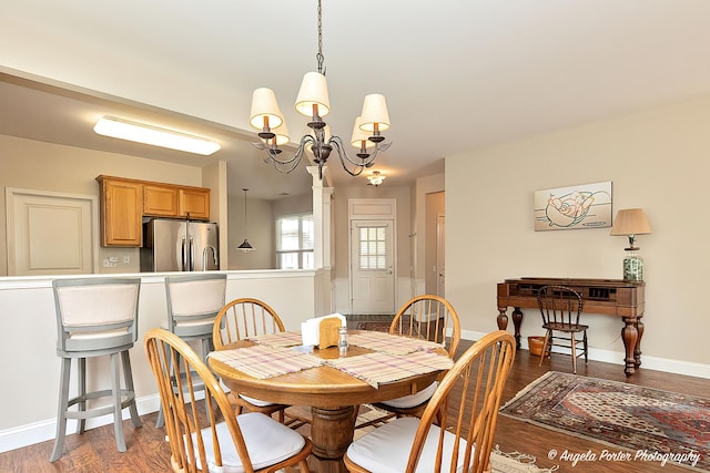 13399 Glenwood Dr, Huntley, IL 60142 - dining area featuring a chandelier and wood finished floors