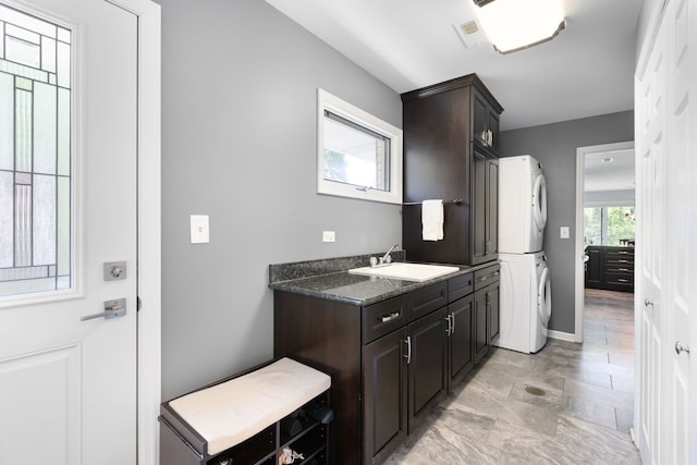 1060 Highland Ave, Lake Forest, IL 60045 - bathroom with stacked washing machine and dryer and vanity