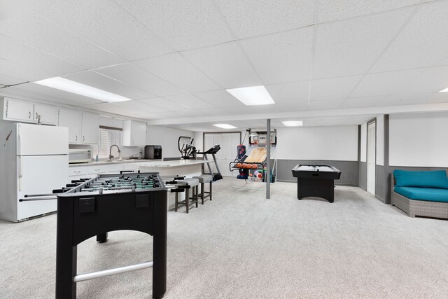 1060 Highland Ave, Lake Forest, IL 60045 - recreation room with a paneled ceiling and light colored carpet