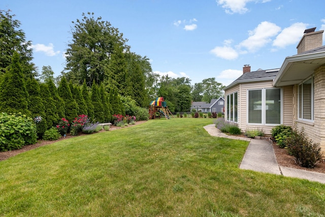 1060 Highland Ave, Lake Forest, IL 60045 - view of green lawn with a playground