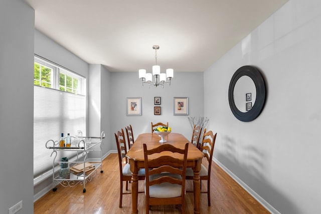 1361 Amherst Ct, Grayslake, IL 60030 - dining space featuring a chandelier and wood finished floors