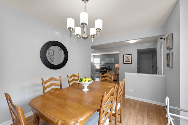 1361 Amherst Ct, Grayslake, IL 60030 - dining space featuring a chandelier and wood finished floors
