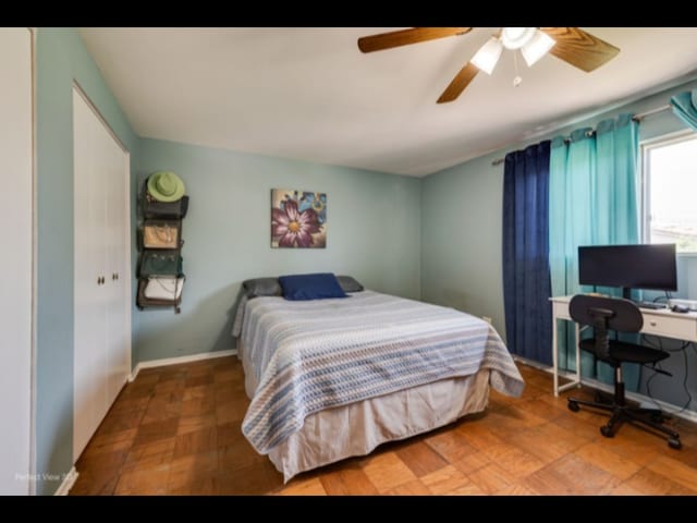5112 Deerpath Rd, Oak Forest, IL 60452 - bedroom featuring a ceiling fan and a closet