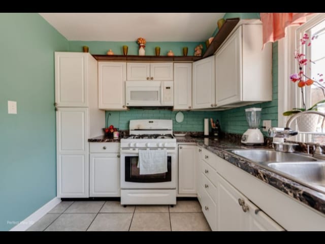 5112 Deerpath Rd, Oak Forest, IL 60452 - kitchen with white appliances, white cabinetry, and dark countertops