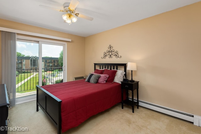 1056 N Mill St Unit 305, Naperville, IL 60563 - bedroom with a baseboard heating unit, light colored carpet, access to exterior, and a ceiling fan