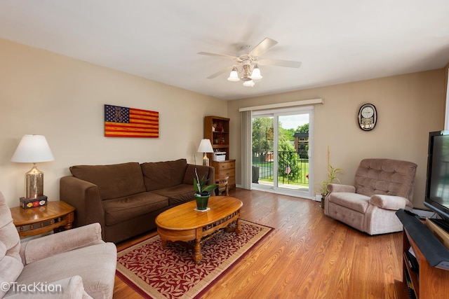 1056 N Mill St Unit 305, Naperville, IL 60563 - living area with a ceiling fan and wood finished floors