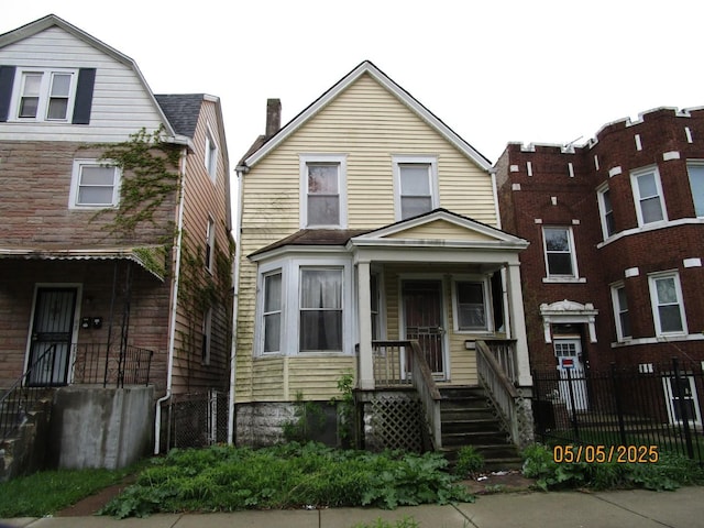 605 E 92nd Pl, Chicago, IL 60619 - view of front of house featuring a chimney